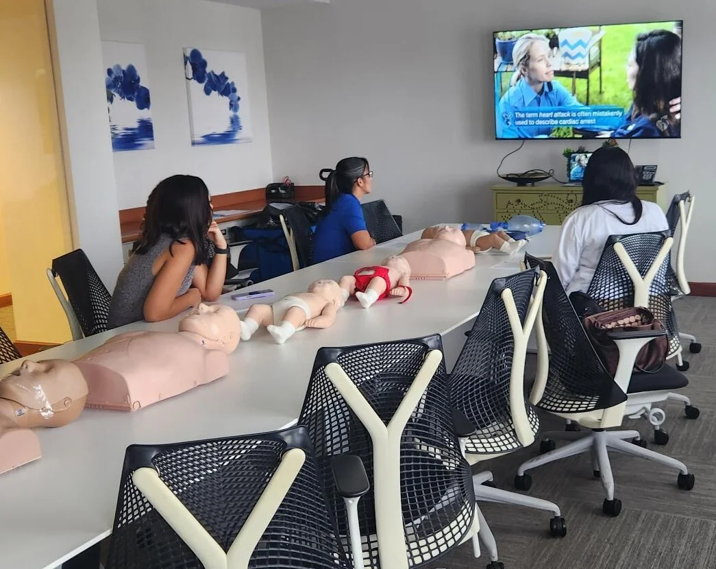Students learning CPR in an in-person FLTS class